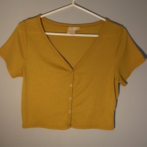 Large cropped yellow button-down shirt